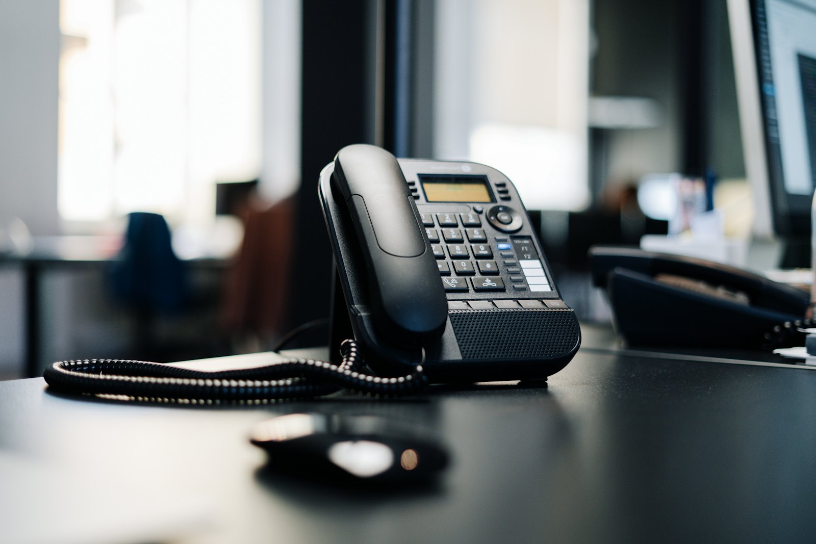 IP desk phone on an office desk